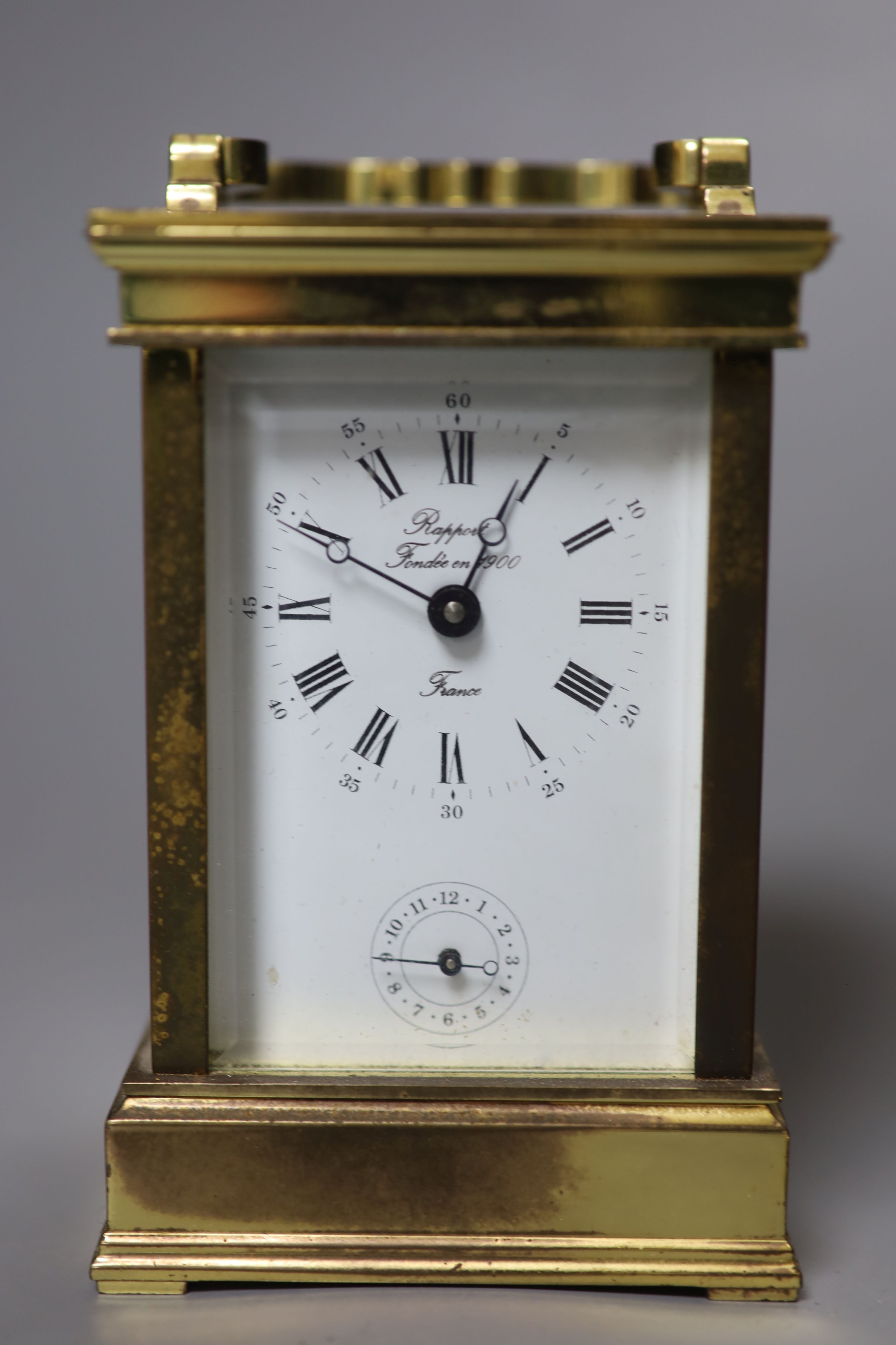 Two French brass eight day carriage timepieces, one with alarm, tallest 13cm with handle down